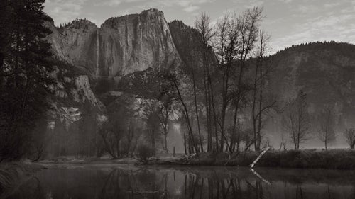 While walking early one morning along the Merced River, I was drawn to this broken log and its reflection on the horizon line as fog drifted through Yosemite valley.