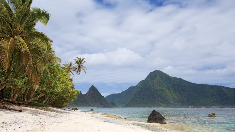 A stretch of the coastline on Ofu, part of the National Park of American Samoa, with the island of Olosega just beyond.