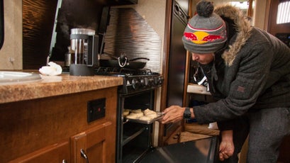 Jamie taking advantage of having a warm, dry space to cook meals. It may have been pouring outside, but inside they were able to make a 5-star breakfast.