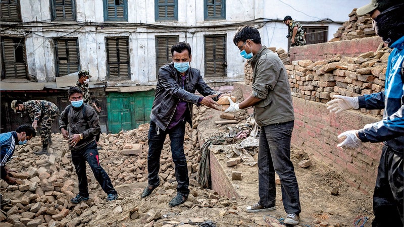 Salvaging ancient bricks in Patan Durbar Square, a Unesco World-Heritage site, last May