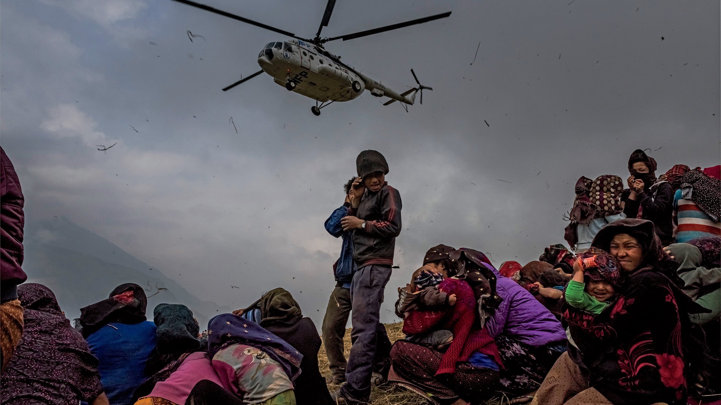 An aid helicopter arriving at the village of Gumada, in Nepal's Gorkha District, last May
