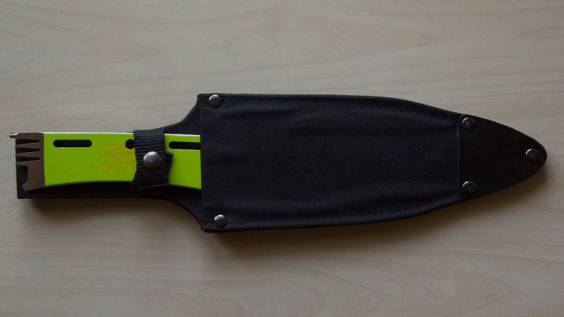 The Kniper's sheath is disappointing. The nylon/plastic construction is just super cheap, retention is only provided by the flimsy snap strap, and the fork end is left exposed to stab your body as you move.