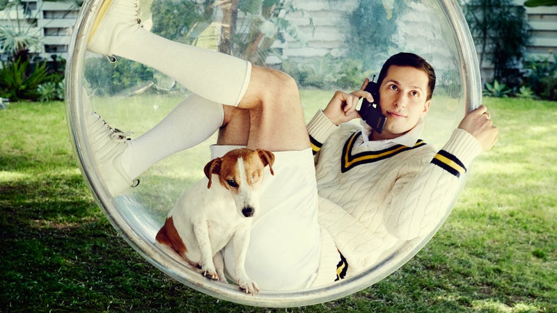 Samberg, right, and introducing Cedric the dog, left.