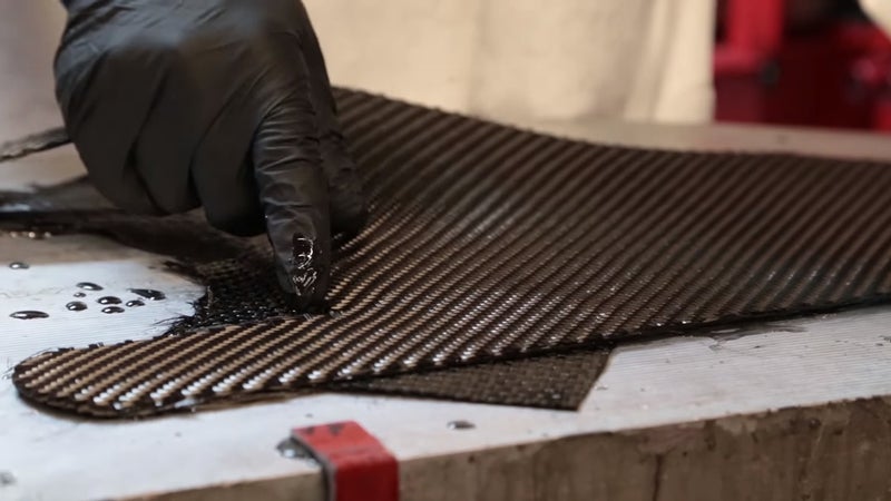 Laying the carbon fiber plys.