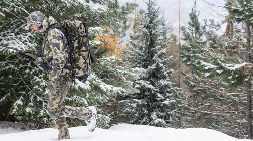 Corey's wearing Kuiu's Verde camo pattern. As you can see, it's a good fit for this pine forest in northern Idaho.