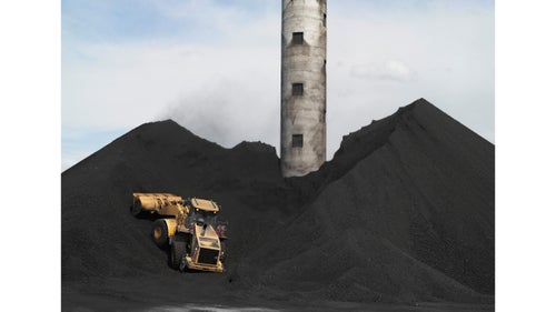 Coal storage at the TS Power Plant; Newmont Mining Corporation, Dunphy, Nevada, 2012.
The TS Power Plant, located on the TS Ranch in Dunphy, Nevada, supplies electricity to the Newmont Mining Corporation to power one of the corporation's gold mines. The ranch uses produced water from the company鈥檚 nearby gold mine to irrigate alfalfa. That alfalfa hay is then fed to 5,500 commercial cattle.
The nuggets of gold that made the American West famous have been gone from Nevada for generations. It is now profitable to mine gold if there is one-tenth of an ounce of gold dust in 2,000 pounds of rock.