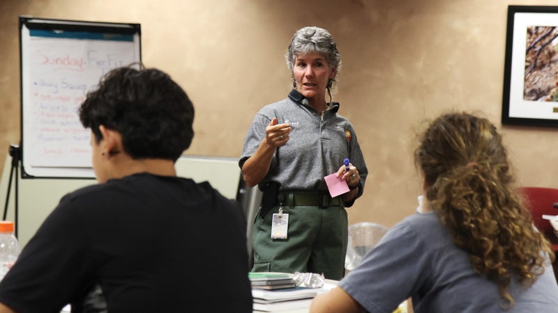 Bequi Livingston instructs the Women in Wildland Fire bootcamp near Albuquerque in 2014. Livingston started the boot camps in 2012 to give women a supportive place to break into the overwhelmingly male wildfire corps.