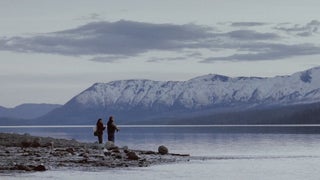 Hilary Hutcheson teaches her father, a retired park ranger, how to fly fish.