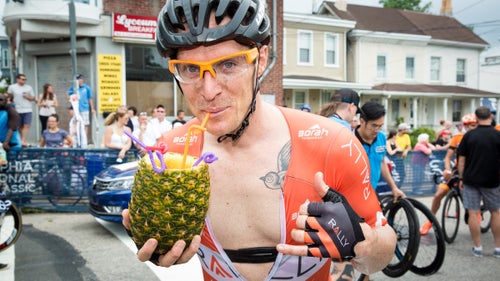 In April, hundreds of cyclists lined up for the United States' most prestigious cycling event, the Philadelphia International Championship. The annual race brings top-notch talent and loads of crazy fans, who come to drink and cheer on the riders. Here are our favorite scenes from Pennsylvania's greatest bike party.To the crowd's delight, Rally Cycling鈥檚 Brad Huff grabbed a particularly exotic adult beverage on his last trip up the Wall and crossed the line no-handed, sipping away. Only in Philly.