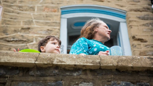 People come in every shape, size, color, creed, and generation to watch the race from Manayunk stoops.
