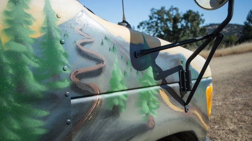 The bus was originally painted yellow, but Taylor commissioned his friend Alex Dunn to paint a wrap-around mural with forest scenes and plenty of singletrack.