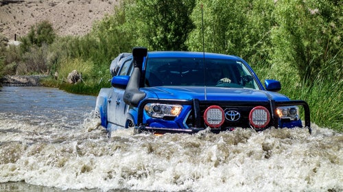 Snorkels raise your air intake way, way above any potential splashes or waves, and also out of dust clouds. They're a good idea for any off-roader.