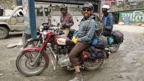 Nick Greece, Jamie Messenger, and Cody Tuttle getting acclimatized to their bikes after a first push on day one. This was the last gas station and paved road we would encounter. Beyond here, gas was sold along the dirt road in 1-liter soda bottles.