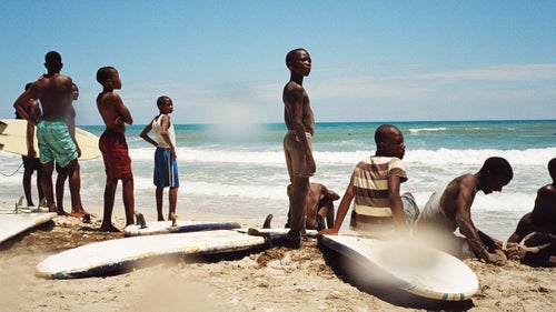 Haiti would be a rare sight on anyone's list of surfing hotspots. Despite beautiful beaches and solid breaks, the country is better known as a poster child for the failure of international aid in the wake of two devastating natural disasters鈥攏ot to mention issues of violence, disease, and endemic corruption that persist today. However, since 2010 a small group of aid workers has been teaching local kids to surf the waves of Kabic Beach, roughly 45 minutes outside of Haiti's cultural capital, Jacmel. Many of these kids, despite growing up on the water, first had to learn to swim. This April, Surf Haiti hosted the country鈥檚 first surf competition matching up against a team from the bordering Dominican Republic. Photographer Mike Magers was there to capture the event, and what turned out to be a non-stop beach celebration. Photo: Contestants and spectators anxious to get back in the water while watching the heats from the beach.
