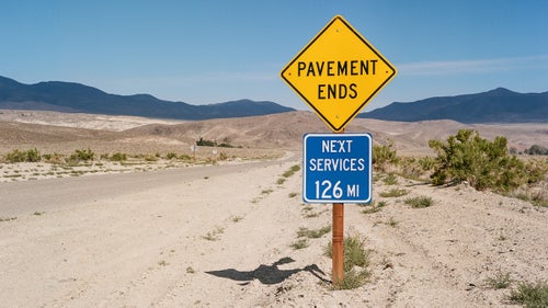 Scott Swaney, a former oilman and current badass a couple years shy of 70, has more first descents in Death Valley National Park than anyone on earth. He spent the past decade looking for everything from tight canyons to massive drop-offs and is believed to have led or been involved with 203 of the 258 first descents in the park. Swaney has burned through partners who couldn鈥檛 stand the heat and hard labor of exploring his hellish playground, but he continues to recruit new ones, eager to keep exploring. This spring, photographer Ian Tuttle, who had never canyoneered, stuffed his camera鈥攁 film Mamiya 645 AFDii鈥攊nto a backpack and followed along.
Photo: Death Valley Road, Inyo County, California.
Death Valley is enormous, hot, dry, rugged, and remote. It鈥檚 the largest national park outside Alaska and holds the world record for hottest air temperature (134 degrees Fahrenheit). Of its 3 million acres, 91 percent is designated wilderness. It鈥檚 not a friendly place if you don鈥檛 know what you鈥檙e doing. As of this writing, there is only one paved road across the park鈥攆lash floods wiped out the other two in 2015. Cell service is sporadic at best. To have any chance of seeing much more than the tourist sites, you need to hike, carrying all of your water, for miles across open desert.