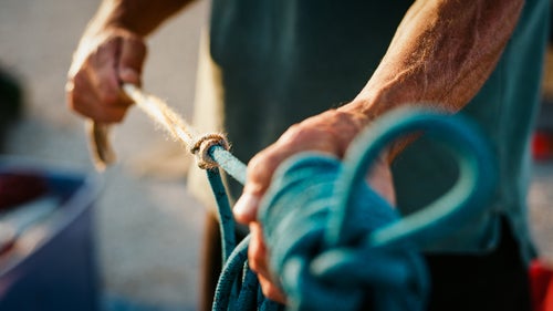 Swaney demonstrating a Prusik knot. Amargosa Valley, May 2, 2016.
There are five of us on this trip, and we car-camp that night on the Amargosa Valley floor, a few feet from a wilderness boundary sign. Swaney teaches me the Prusik knot, explains ascenders, and talks about how it鈥檚 likely that no human has ever been where we鈥檙e going.