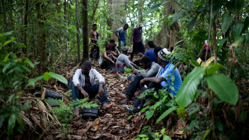 Migrants resting in the jungle.