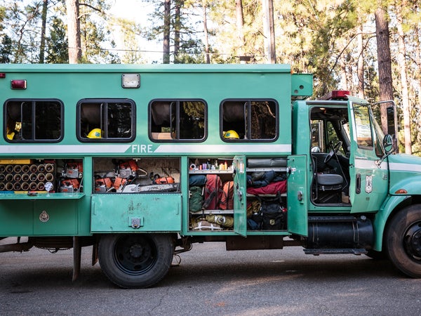 You need the right gear to go trail running, skiing, or mountain biking. You really need the right stuff if you spend weeks fighting infernos in the middle of a forest. To find out what wildland firefighters rely on, we hooked up with Kevin Mecham, a 12-year veteran with the Tahoe Hotshots.
International Crew Haul
Mecham and the Tahoe Hotshots named their 2006 two-wheel-drive crew hauler Eight Ball. The squad boss drives, the captain rides shotgun, and the eight crew members sit in the back, with the most senior toward the front and the newest guys in the back. All of their tools go into side compartments, while their personal gear fits in racks and nets above the seats.