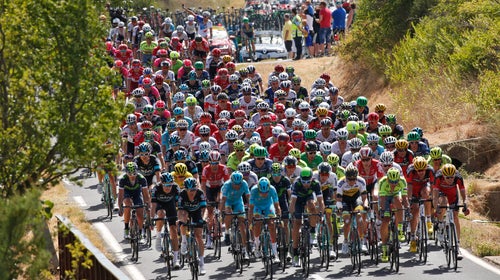 The pack rides during the eleventh stage of the Tour de France cycling race on July 13.