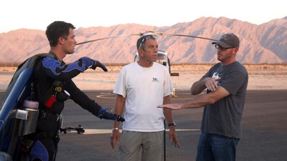 Rex talks with his team before his first jet-powered flight.