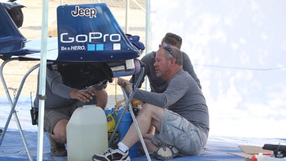 The X-Wing Project team, including John Redman from JetCat USA,  checks the 6-foot carbon fiber delta wing before Rex’s jump.