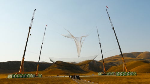 This is the moment everyone exhaled. One second before Aikins landed in the net, he rolled onto his back to help his 200-pound body absorb the impact of stopping his 120 mph freefall. Air ratchets, or powerful cylinders often used in the Hollywood stunt world, cushioned his fall via a system of ropes and pulleys attached to the corners of the net, which was not elastic.