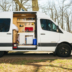 Eli Meir Kaplan/Wonderful Machine for Outside
John Stifter and Janna Irons pose with their Dodge Sprinter van on Thursday, March 14, 2016 at Shenandoah National Park in Virginia.