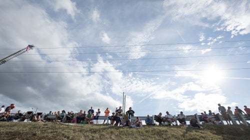 People arrive hours before the start to grab their favorite spot and watch the mad dash to the water.