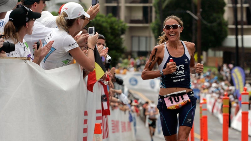 Ironman athlete Chrissie Wellington, of Great Britain, runs uphill in Kailua-Kona in the 26.2-mile marathon during the Ironman World Championship triathlon on Saturday, Oct. 10, 2009, in Kailua-Kona, Hi. (AP Photo/Chris Stewart)