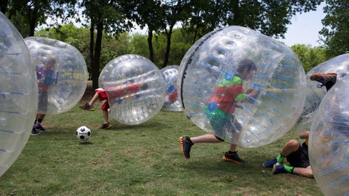 It's not surprising that kids playing Bubble Soccer at a birthday party often spend more time trying to knock over their friends than actually chasing the ball.