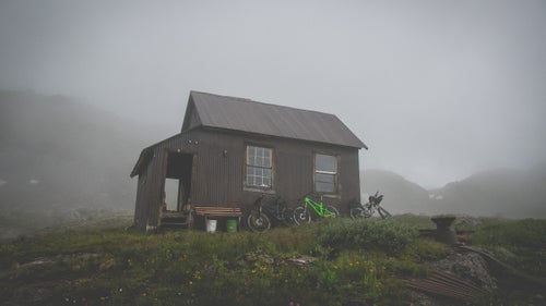 This old mining cabin saved our crew. Instead of making a push over an exposed pass in pouring rain, we were able to post up, make a fire, and sip whiskey until we were warm and in good spirits.
