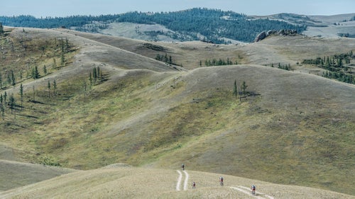 Four riders bomb down the doubletrack on Stage 2, the hardest of the race with 8,000 feet of climbing. It took the lead trio five hours and 15 minutes to finish.