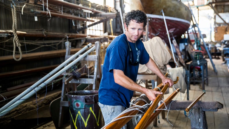 Christian Langendal works on a boat.