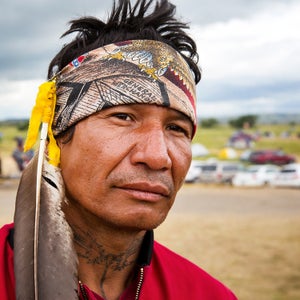 I first made the 1,600-mile journey from Berkley, California, to the Standing Rock Sioux Reservation in late August and again in early September to document this latest skirmish in the fight to shield fresh water from pollution, to keep fossil fuels in the ground, and to ensure greenhouse gasses stay out of the atmosphere. 
When I arrived, I realized there are two major stories unfolding here on the windswept prairie of North Dakota. One of them, the one that has drawn the most media attention, plays out in rallies and hashtags, Facebook Live streams, and confrontations with pipeline security workers. The other is more difficult to see unless you visit the camp itself, where old friends and long estranged tribes have reunited, and people share songs, prayers, and stories as they articulate a future in which tribal lands are no longer national sacrifice zones and the zero-sum logic of industry is not taken for granted.
Photo: For nearly six months, Frank Archambault of the Standing Rock Sioux has camped with other protesters on the edge of his tribe’s reservation, near where the Dakota Access Oil Pipeline would plunge under the Missouri River. A single father of five, he’s concerned that if the pipeline bursts or leaks, it will pollute the Missouri, poisoning the source of Standing Rock’s water and potentially sickening his kids.