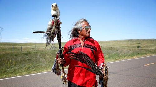 Waki Little Thunder of the Rosebud Sioux Tribe returns to camp after a march to the proposed route of the Dakota Access Pipeline near the Standing Rock Reservation. The marches are an opportunity to not only build momentum for the movement and attract media attention, but also for prayer, ceremony, and celebration.