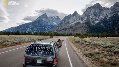 Nearing the end of a 48-state road trip, Sean Vranizan leans out to get a shot on the fly in Grand Teton National Park in Wyoming. He and two other artist friends posted photos along the way on Instagram @modernbaystudios.