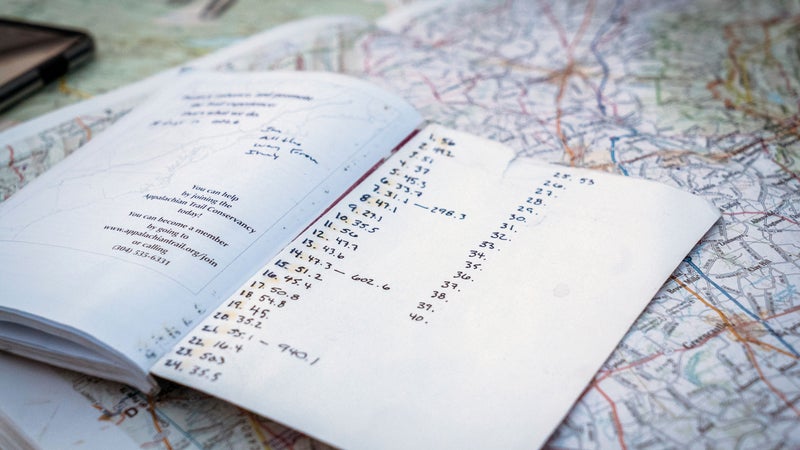 A trail map and progress notebook, seen during Karl Meltzer's attempt to break the record for running the length of the Appalachian Trail on 27 August, 2016. // Interpret Studios / Red Bull Content Pool // P-20160829-01421 // Usage for editorial use only // Please go to www.redbullcontentpool.com for further information. //