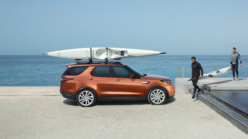 The new Discovery can lower its optional air suspension to make loading items onto its roof much easier.