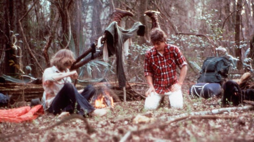 Some campers try to dry off their gear in this undated 35 mm slide from Congaree National Park.