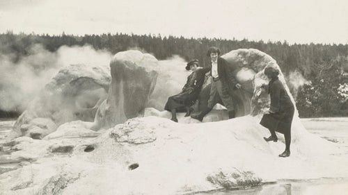 Visitors clamber all over Grotto Geyser in Yellowstone in this undated photo.