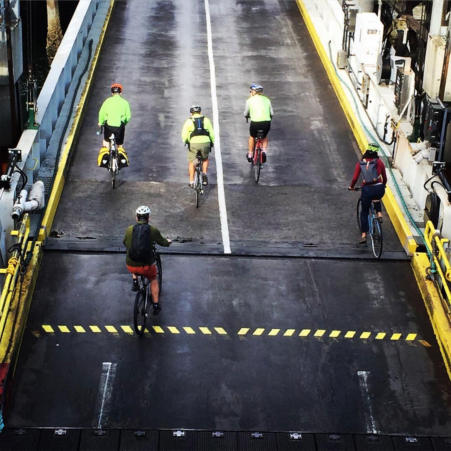 @instaphotoseattle - Cyclists off the Bainbridge Ferry. #PNW