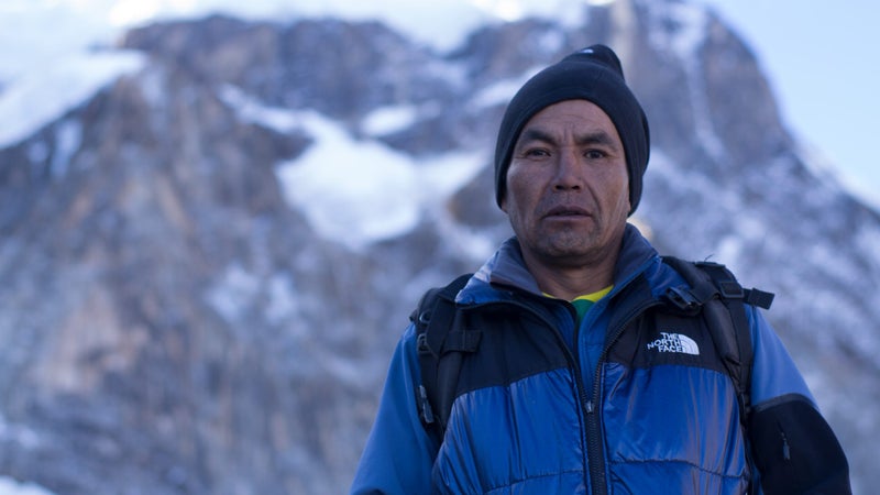 Jose Lazo in front of Mount Illimani.