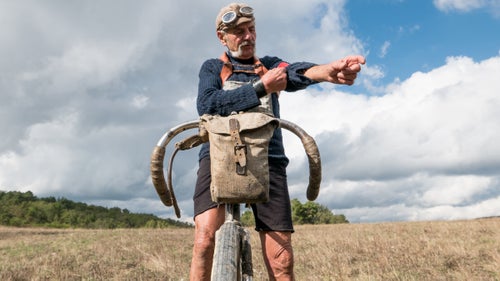 Before carbon frames, wide-range groupos, and specialized nutrition regimens, gritty cyclists pedaled heavy steel steeds down the roads of Tuscany. They wore wool and fueled with bread, prosciutto, and wine, and were celebrated as heroes in a country obsessed with bikes. Today, the spirit of those riders is celebrated with L’Eroica (or The Heroic), a one-day event in October where thousands of people from all over the world sport period kit and pedal vintage bikes (anything produced prior to 1986). The rides, which start in the small town of Gaiole, range from a leisurely 29 miles to an all-day 130-mile sufferfest. All options include plenty of gravel, views of vineyards and ancient castles, and rest stops stocked with the same delicious Italian staples that the old guard relied on. 

Photo: Luciano Berruti’s bicycle carries the #1 rider-number for a good reason: he’s participated since L’Eroica began in 1997. A former racer and avid collector, Luciano runs a bicycle museum, the Museo della Bicicletta, in Cosseria.