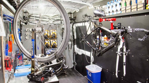 Beeline's traveling bike shop in a van.