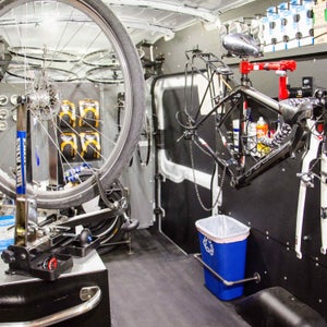 Beeline's traveling bike shop in a van.