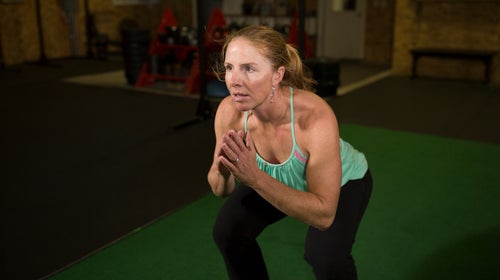 Wright performing a squat.