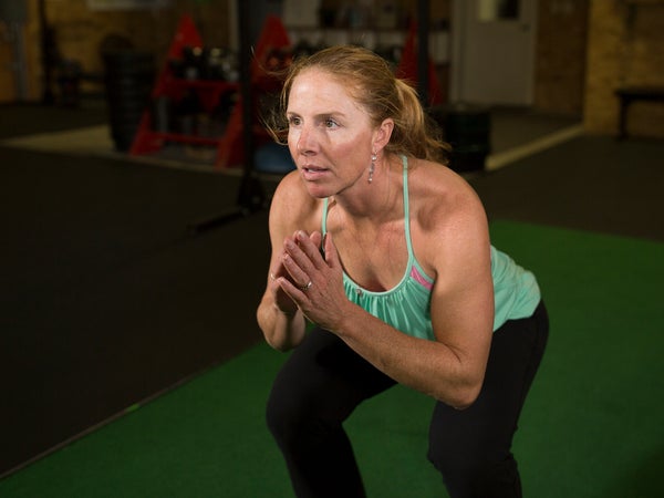 Wright performing a squat.