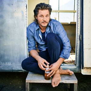 Before the trailer, he lived in an old Ford Econoline with a pop-up bed.