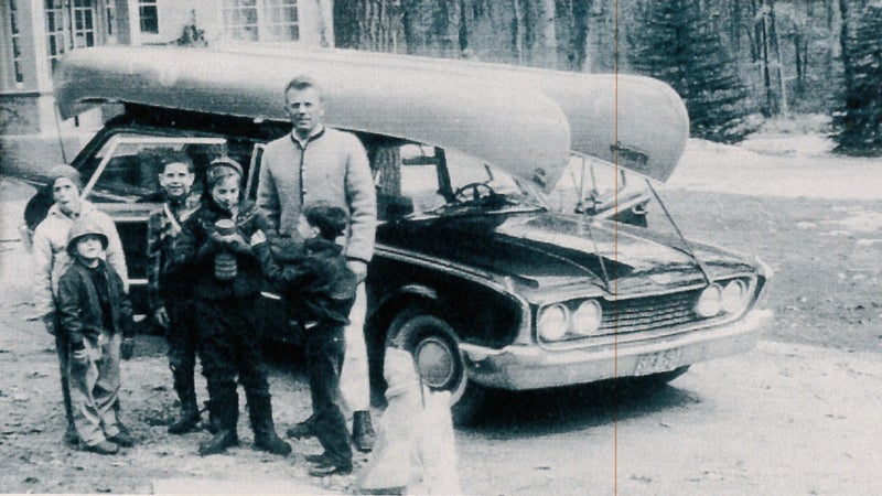 The author (at far left) with his father, his sister Kate (fourth from left), and his cousins, near Pine Lake.