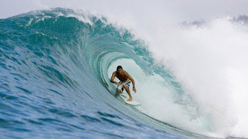 Andy Irons surfs in Bali, Indonesia, in 2006.